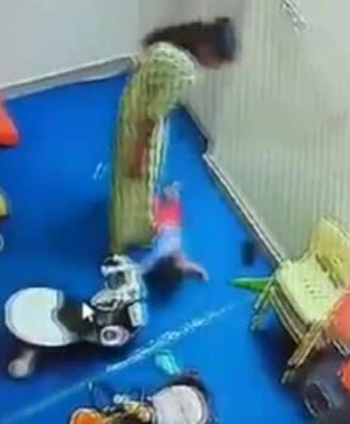 Noida day care incident, torture of 15 month old girl, day care CCTV video, Noida child abuse case, cruelty with girl in day care, entire incident captured in CCTV, Noida day care video, Noida day care CCTV, girl slapped,