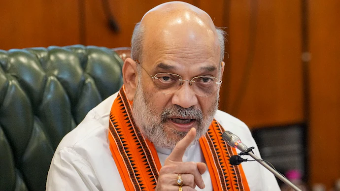 PM CM Arrest Bill, 130th Constitutional Amendment Bill, Amit Shah Lok Sabha, Modi Government, Kejriwal Arrest, Opposition Protest, Government of Union Territories Amendment Bill, Jammu and Kashmir Reorganisation Amendment Bill
