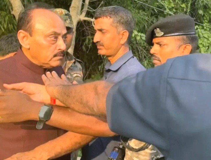 Bihar elections, Lakhisarai, Vijay Sinha, RJD MLC Ajay Singh, attack on car, cow dung, slippers thrown, bulldozer, Bihar Deputy CM, Bihar politics, election violence, Assembly by-election 2025, BJP, RJD, Jungle Raj