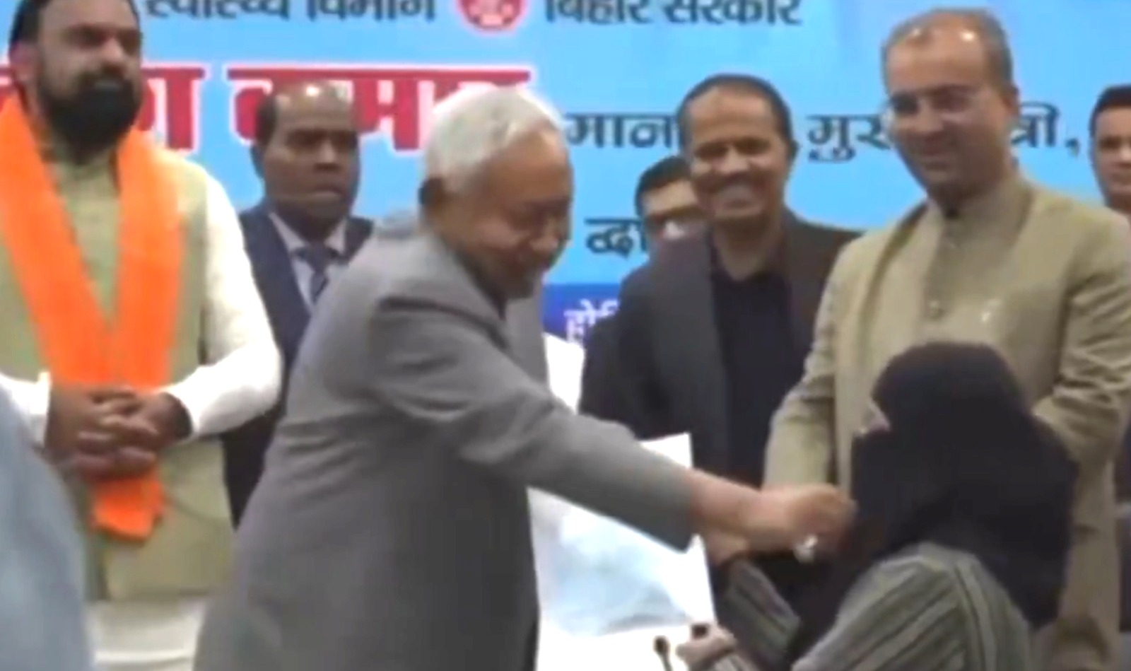 Bihar CM Nitish Kumar, hijab controversy, Pakistani gangster Shahzad Bhatti's threat, Muslim woman doctor asked to remove hijab, Nusrat Parveen will not join her job, Bihar government's media ban on the event, India-Pakistan gangster threat, religious sensitivity in politics, Nitish Kumar and the hijab controversy